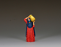 An Arab Woman Carrying Water